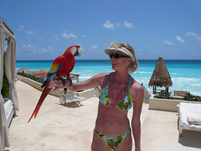 Julie and macaw on la playa at Aqua Cancun